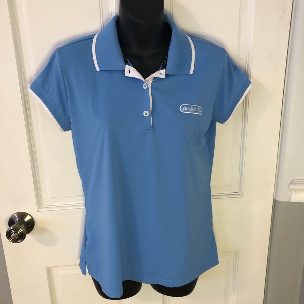 Adidas womens light blue golf polo size medium.